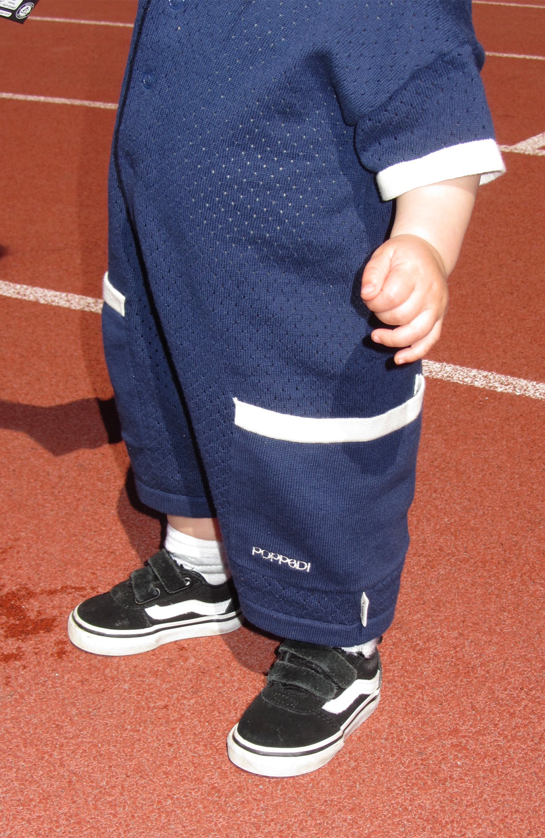 League Romper - Navy Poppedi Romper