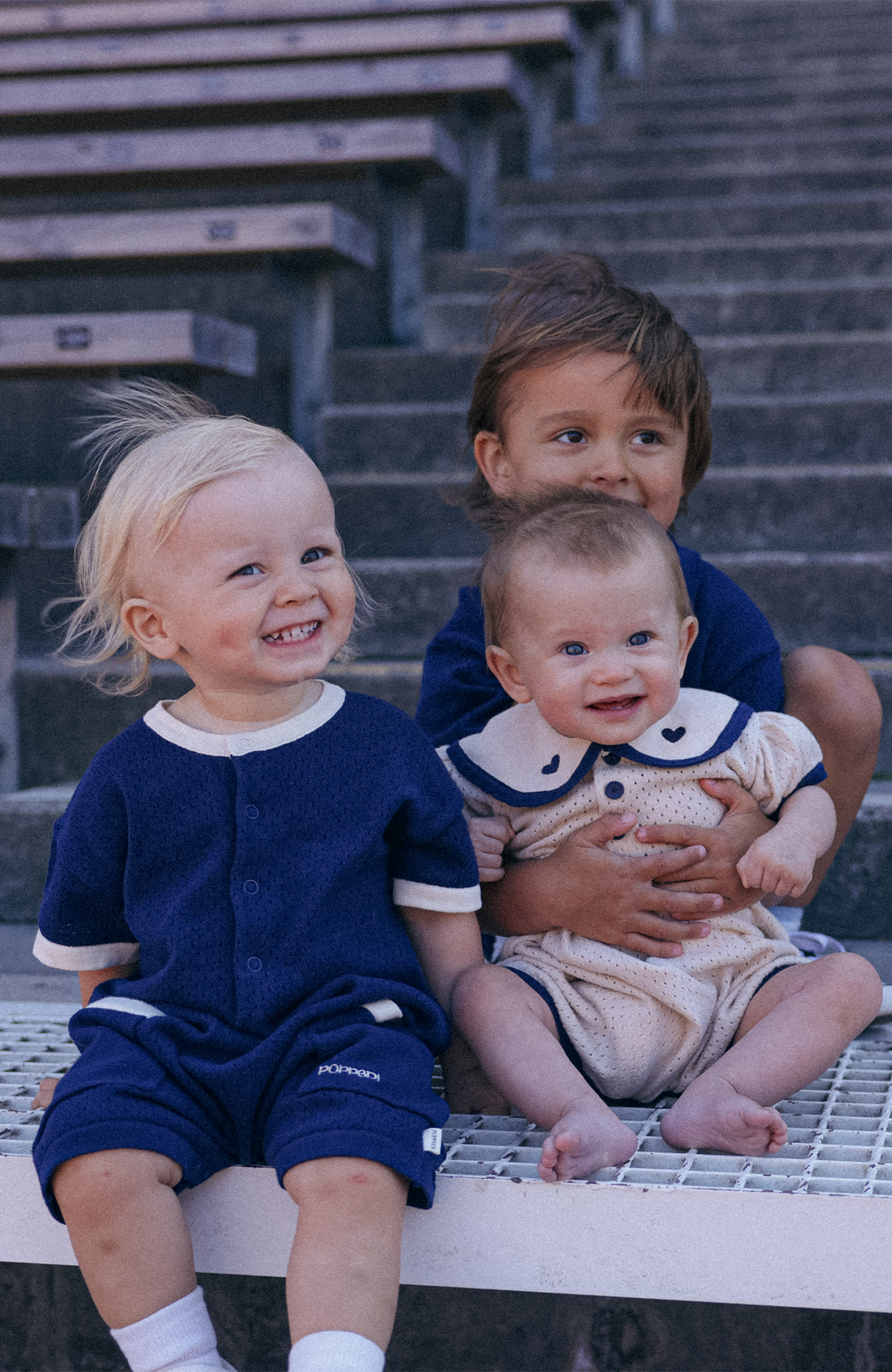 League Romper - Navy Poppedi Romper