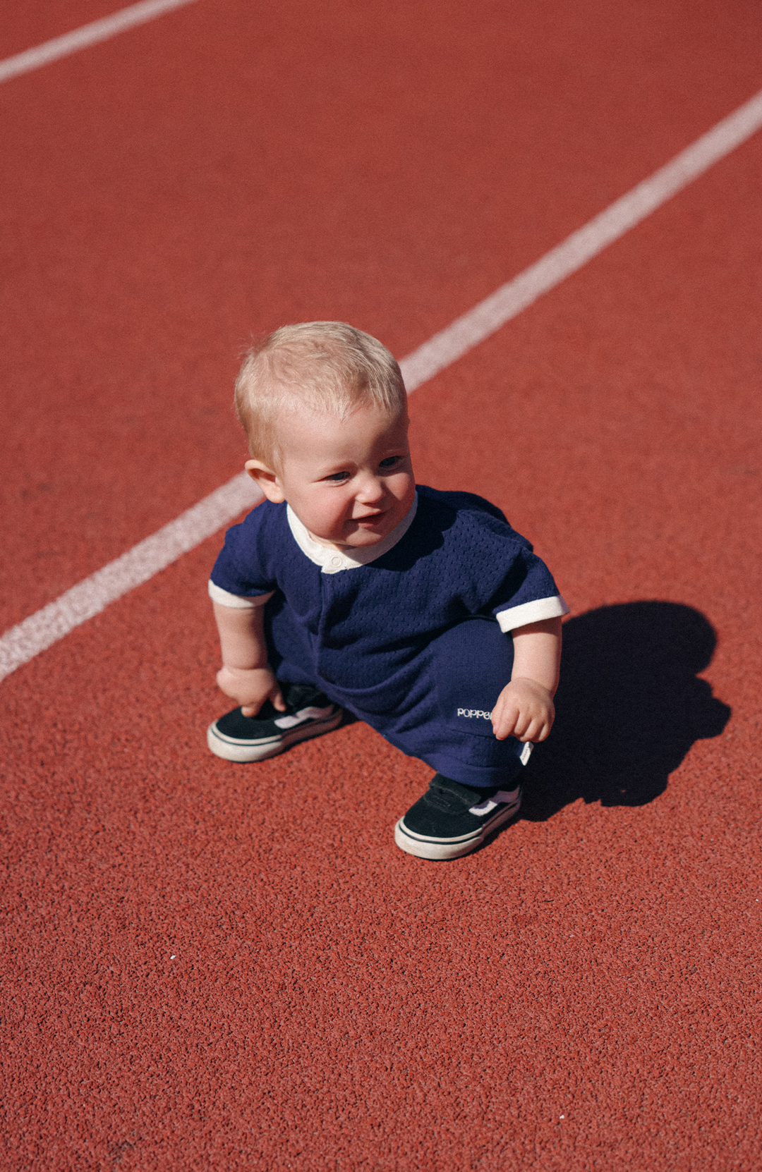 League Romper - Navy Poppedi Romper
